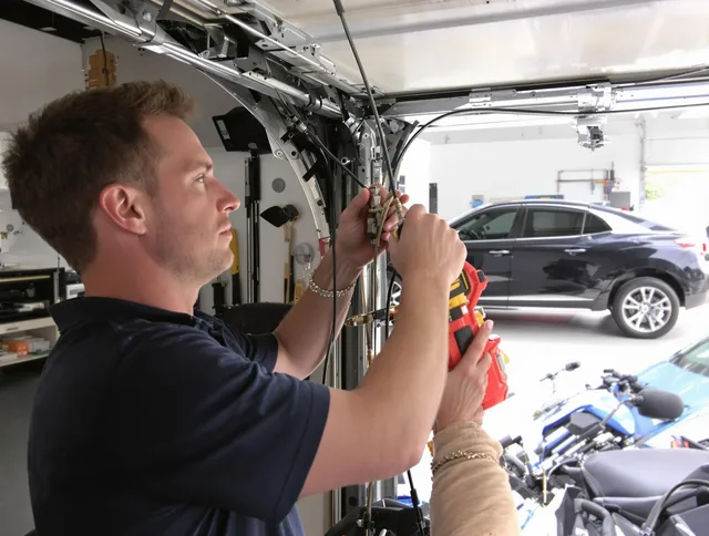 Lake Elsinore Garage Door Repair safety certified technician performing cable replacement in Lake Elsinore