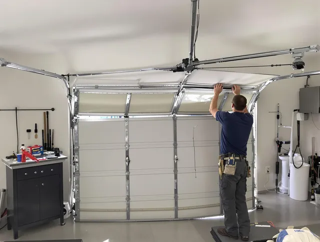 Lake Elsinore Garage Door Repair specialist performing precise section replacement on Lake Elsinore garage door