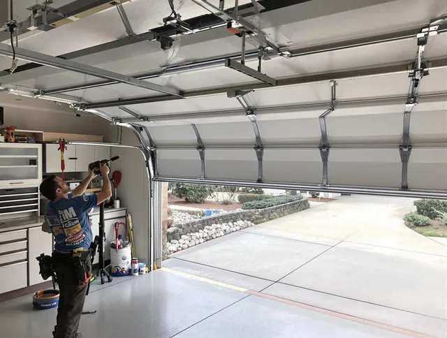 Garage door track repair service by Lake Elsinore Garage Door Repair in Lake Elsinore